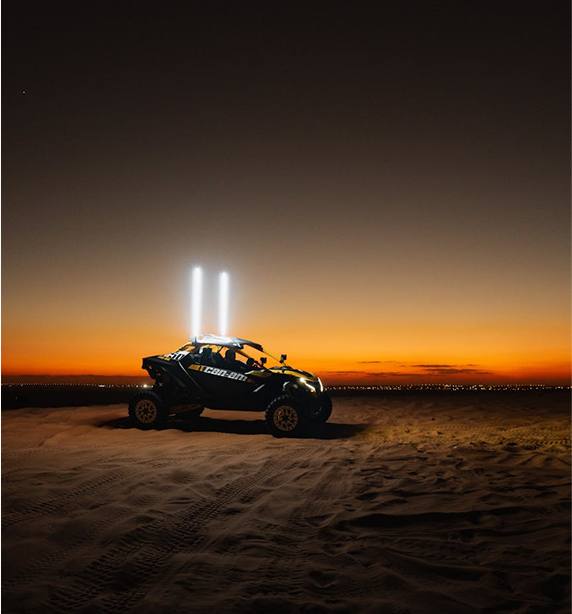 Desert vehicle at sunset - Contact Dunes to Downtown for your next adventure