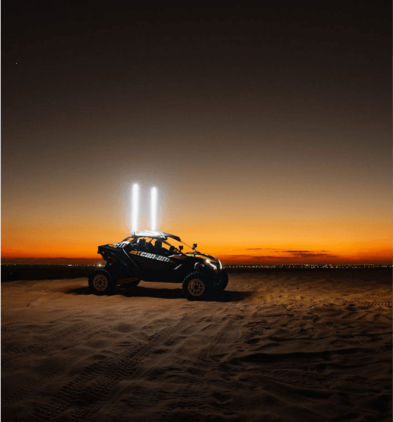 Desert vehicle at sunset - Contact Dunes to Downtown for your next adventure