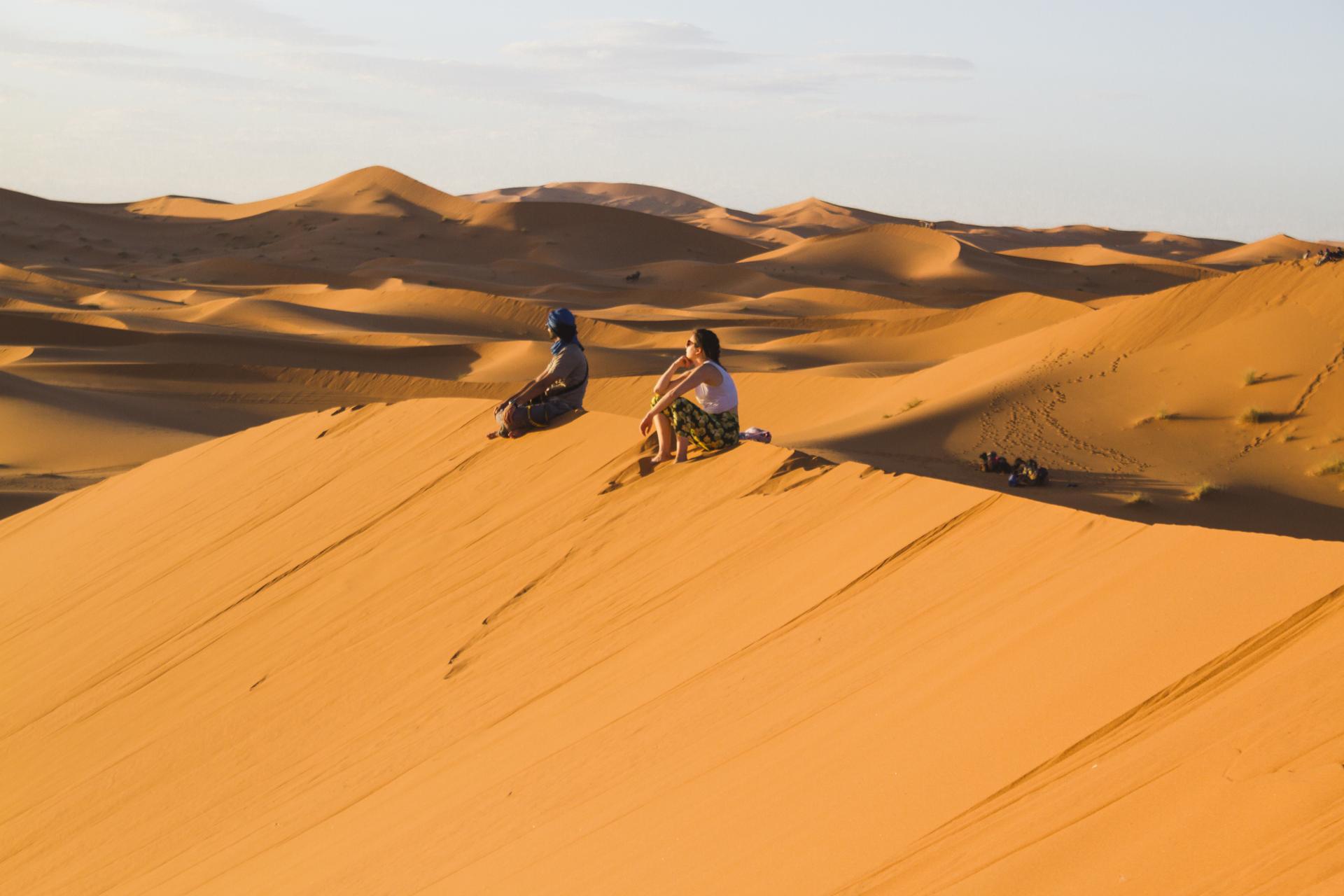 Golden sunset over Lahbab Red Dunes during Dubai evening safari