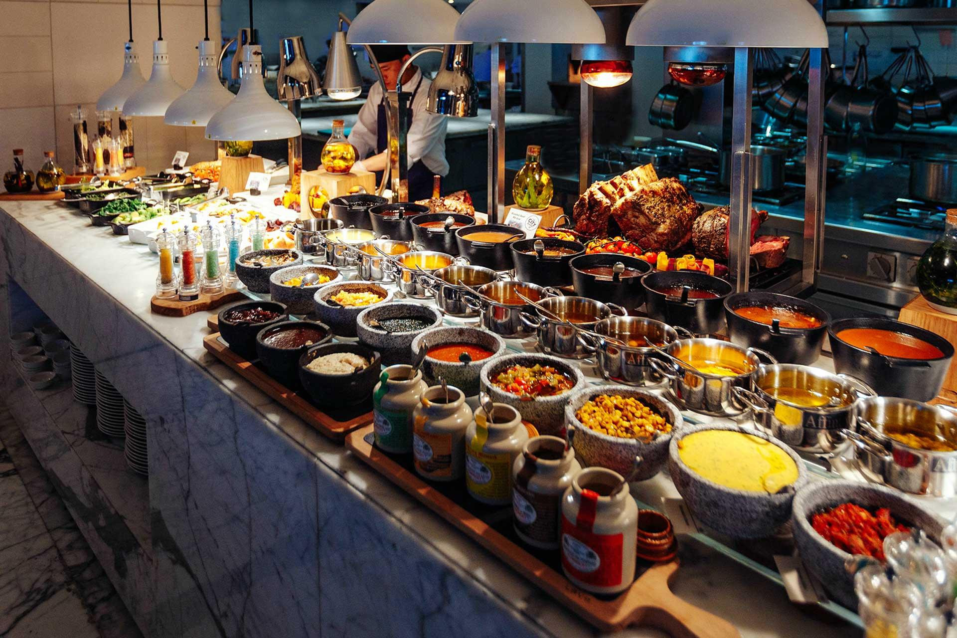 BBQ dinner setup on dhow cruise deck during Dubai Creek tour