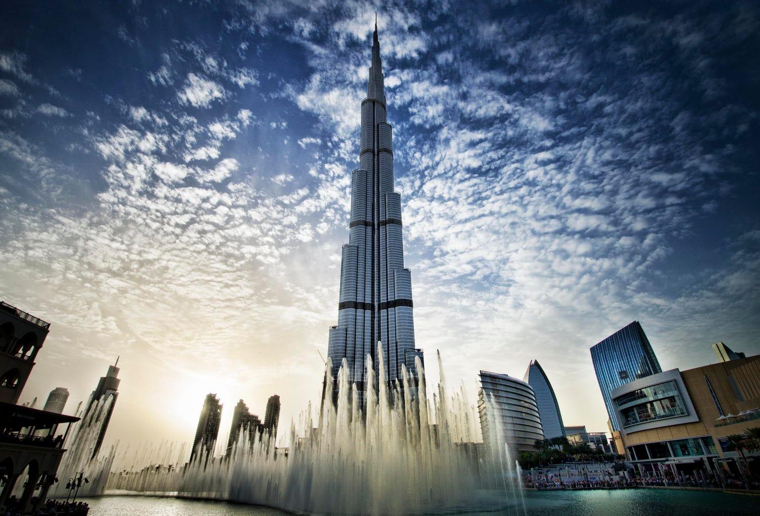 Burj Khalifa towering over the Dubai skyline at dusk