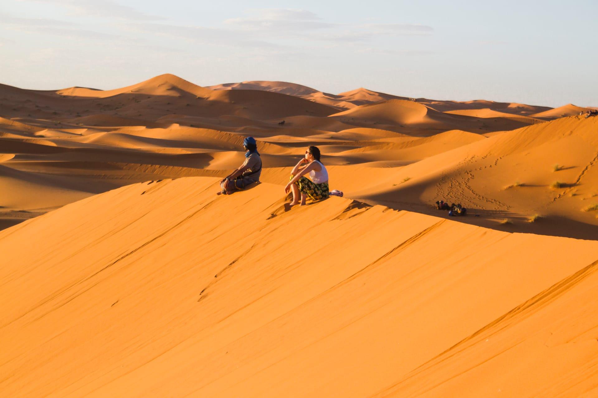 Golden sunset over Lahbab Red Dunes during Dubai evening safari