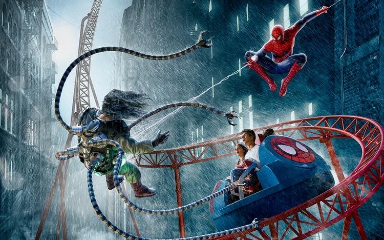 Roller coaster and themed zones inside IMG Worlds of Adventure indoor theme park